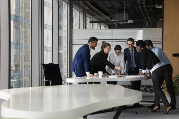 istock In modern boardroom six multiracial businesspeople working on project 1409136595
