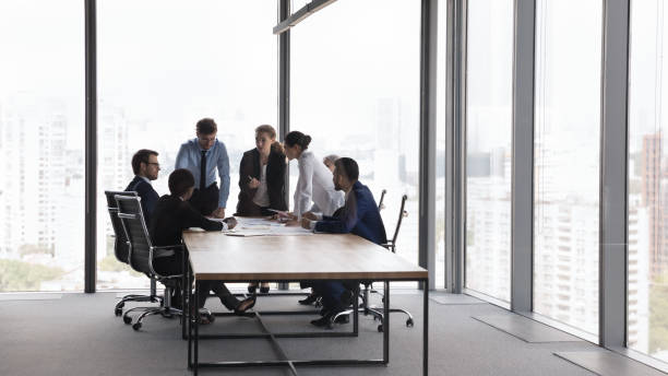 istock Multiethnic workmates engaged in group meeting at conference room 1409136761