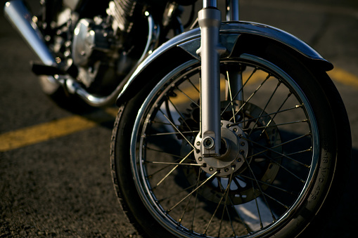 Front wheel and disc brake of a classic motorcycle. High quality photo