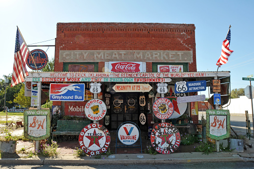 Erick, OK, USA, Oct. 11, 2019: The former City Meat Market building in Erick, Oklahoma now houses the Sandhills Curiosity Shop, a Route 66 roadside attraction.