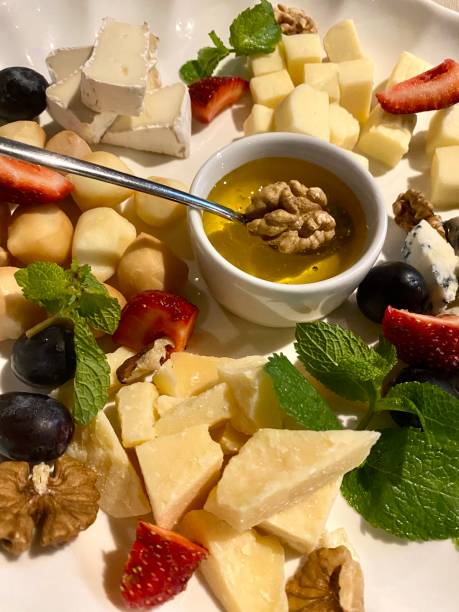 istock Cheese plate with walnut and honey 1409152726