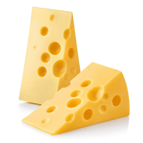 istock Two delicious cheese pieces on white 1409153586
