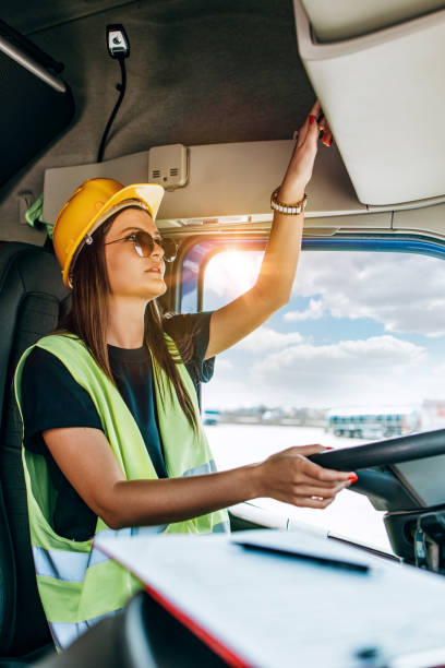 istock Professional happy female truck driver working 1409155537