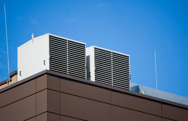 istock Mechanical ventilation outtakes or intakes on the roof. 1409157869