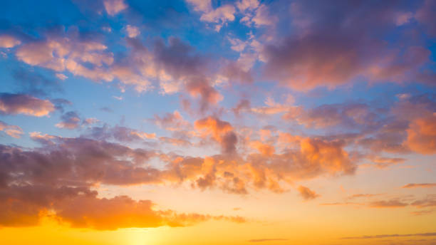 istock Sky with clouds during sunset. Clouds and blue sky. Panoramic photo for design and background. 1409162443