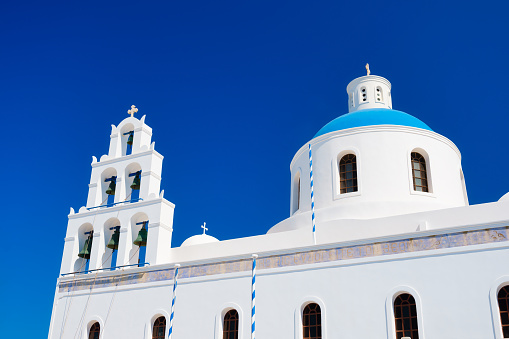 Church on the island of Mykonos, Greece. Narrow streets and traditional architecture. Photo as wallpaper.