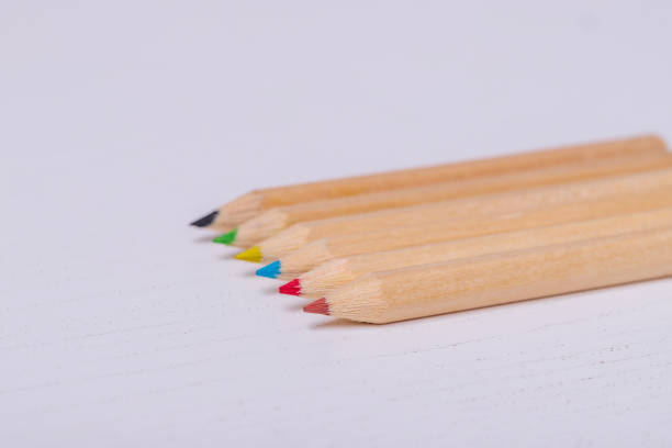 istock Wooden colored crayons on a white background. 1409166220