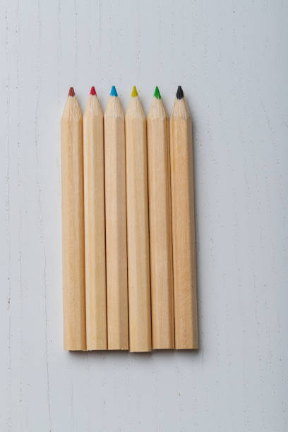 istock Wooden colored crayons on a white background. 1409166221