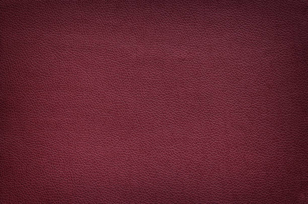 texture of matte leather maroon color, vignette. - leather material pattern rough imagens e fotografias de stock