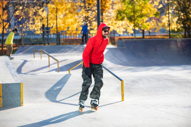 istock Middle age man roller skating in skateboard park 1409168189