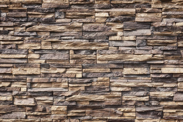 istock Texture of decorative facing stone, stone background. 1409168309