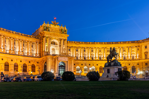 Vienna, Austria - October 2021: Hofburg palace and statue of Prince Eugene at night