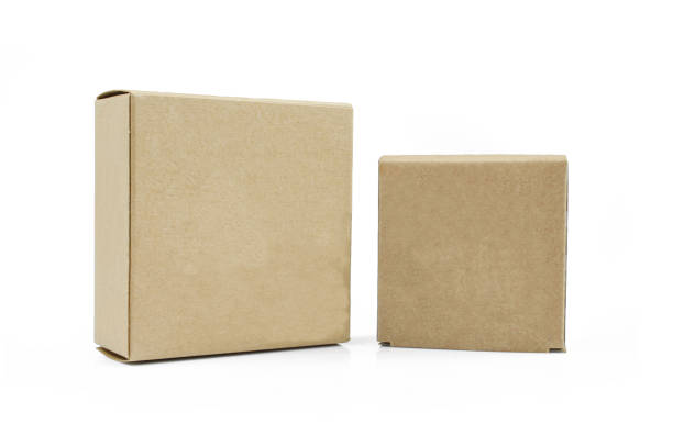 istock Two closed carboard boxes isolated on white background. 
Blank, carton made packages 1409170684