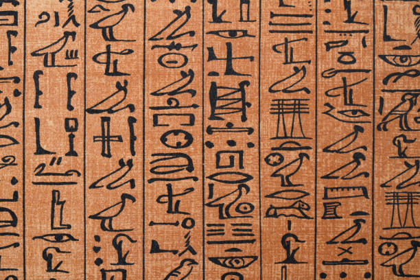 Ancient Egyptian hieroglyphs from the Papyrus of Ani a papyrus manuscript Vintage illustration Ancient Egyptian hieroglyphs from the Papyrus of Ani a papyrus manuscript in the form of a scroll with cursive hieroglyphs and color illustrations that was created c. 1250 BCE, during the Nineteenth Dynasty of the New Kingdom of Ancient Egypt. egyptian art stock illustrations