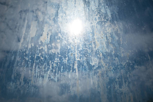 istock Dirty glass lit by the sun. Unclean window soiled with dus 1409175932