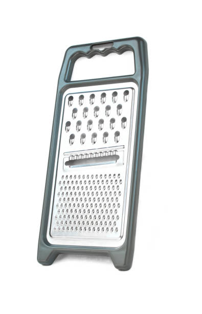 istock Shiny metallic grater with grey handle isolated on white background. 1409177437