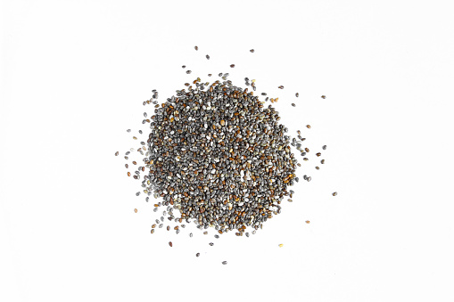 Pile of chia seeds isolated on white background