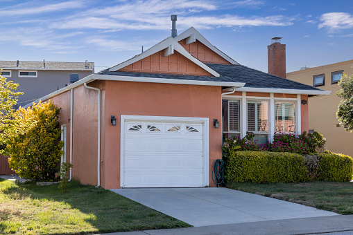 High quality stock photo of a home exterior in a residential neighborhood in California.