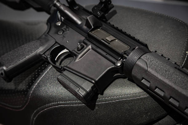 istock Automatic carabiner on a motorcycle. Weapons for police, special forces and the army. Automatic carbine with mechanical sights. 1409181179