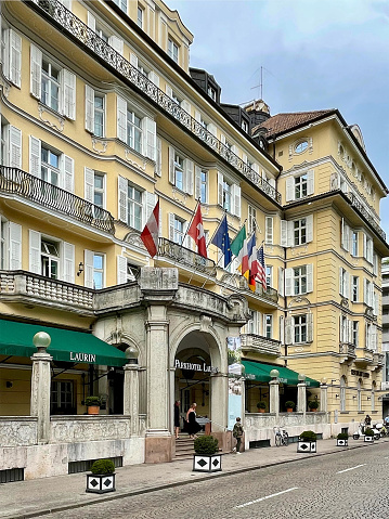 Tourists are visible outside the five star Grand Hotel Tremezzo on Lake Como in Lombardy, Italy