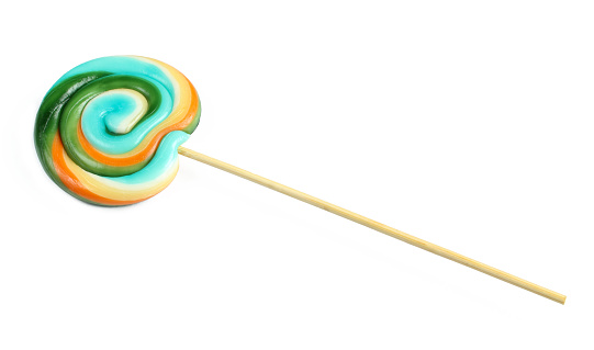 Colorful circle shaped lollipop isolated on white background. Delicious sucker on wooden stick