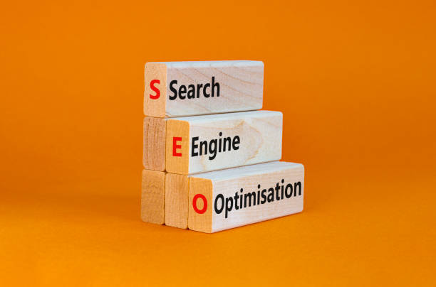 istock SEO search engine optimisation symbol. Wooden blocks with words 'SEO search engine optimisation' on beautiful orange background, copy space. Business, SEO search engine optimisation concept. 1409185402