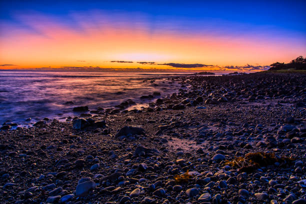 istock Sea Forster Pebbles sun crown Dawn 1409186321