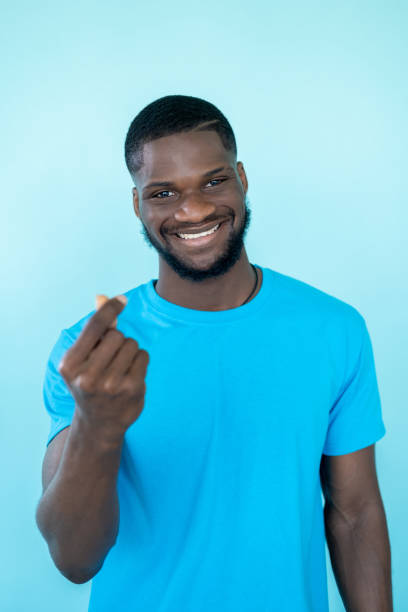 istock finger heart love gesture supportive man care 1409193848