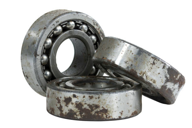 istock Bearing on a white background. Old worn bearing covered with rust 1409193894