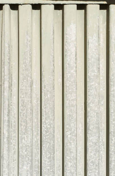 istock Aged rusted white steel corrugated sheet texture for background construction garage door theme in Sofia, Bulgaria, Eastern Europe 1409194057