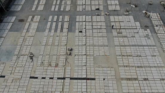 Hard tiled floor in porcelain stoneware (gres porcellanato). Shallow focus.