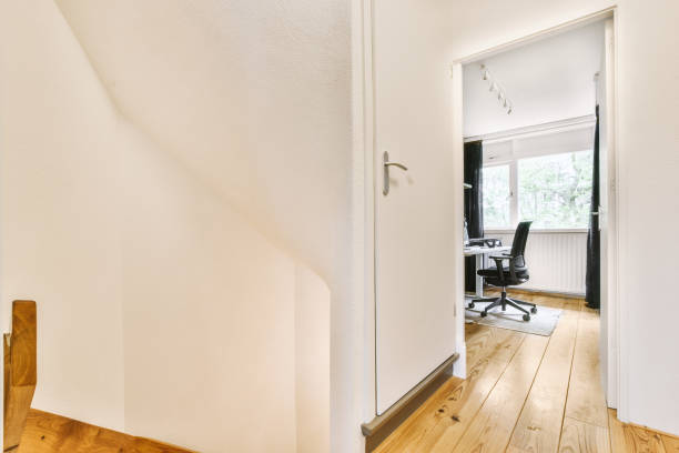 istock View of home office room from corridor 1409196482