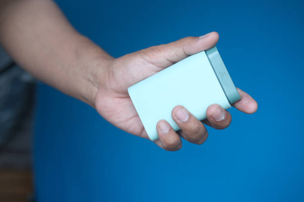 istock man's hands taking medicine from a pill box 1409197505