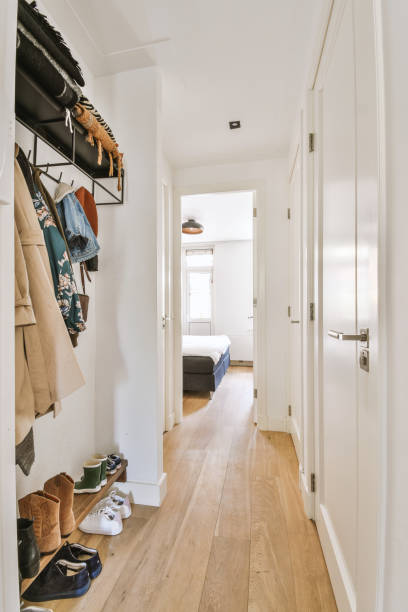 istock Narrow wardrobe in light room at home 1409199238