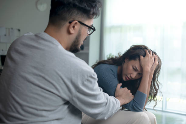 istock Asian couple arguing shouting blaming each other of problem. 1409200964
