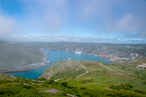 A view of St. John's harbour in Newfoundland, taken from atop Signal Hill, with the fog almost cleared up.