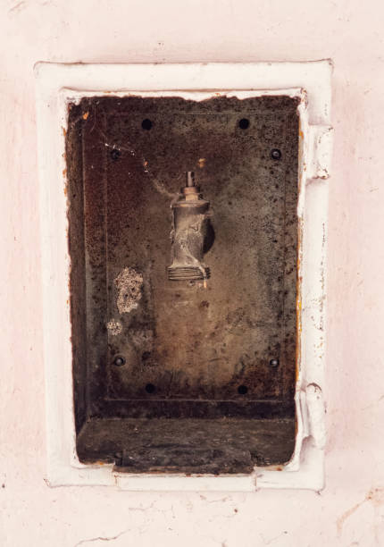 Old faucet in masonry