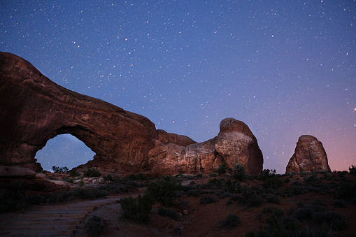 Arches rock national park at night with distortion and gain.