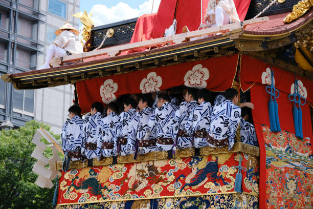 Musicians perform atop the lead float at the Gion Festival stock photo