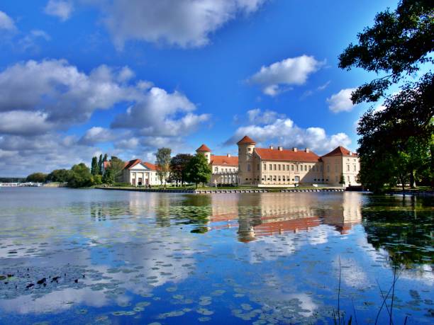 istock Buildings reflecting in the water 1409221836