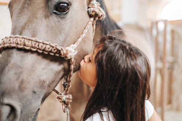istock Cowgirl with her horse. 1409225344