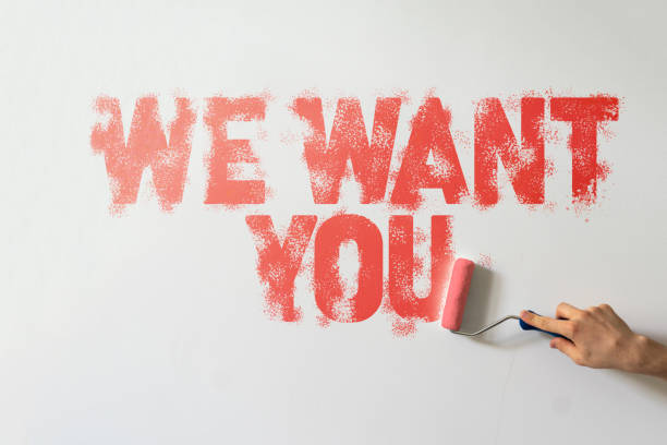 istock we want you text on the wall, creative hiring banner 1409228416