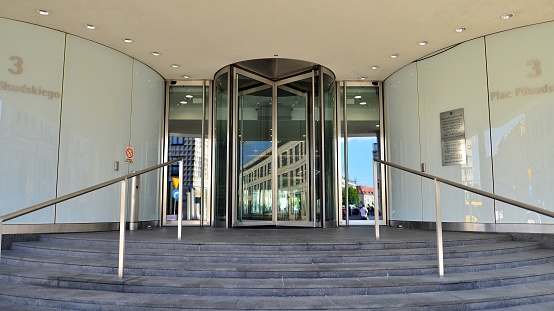 Warsaw, Poland. 23 June 2022. Revolving door in reception of the Metropolitan Business Center office building.