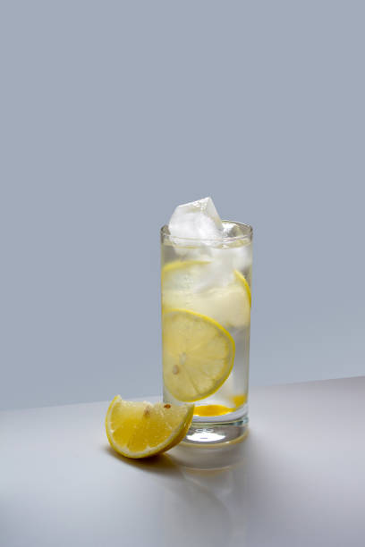 istock water with lemon and ice cubes in a glass 1409237602