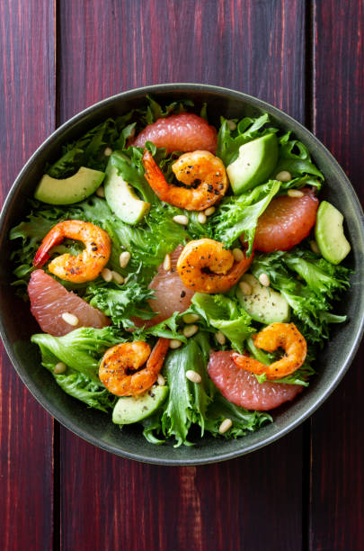 istock Salad with shrimp, grapefruit, avocado and nuts. Healthy eating. Diet. 1409242300