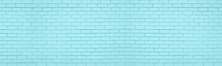 Light teal old brick wall wide texture. Pastel aqua color large masonry. Pale turquoise panoramic background