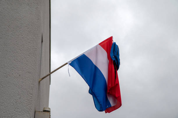 istock Bag And Flag A Dutch Tradition At Amsterdam The Netherlands 1409252105