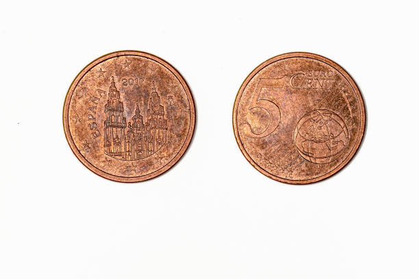 istock 5 euro cent coin on white background, obverse and reverse. 1409259412