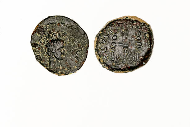 istock Ancient Roman bronze coin. Obverse and reverse - blank background. 1409259457
