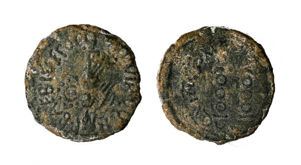 istock Ancient Roman bronze coin. Obverse and reverse - blank background. 1409259468